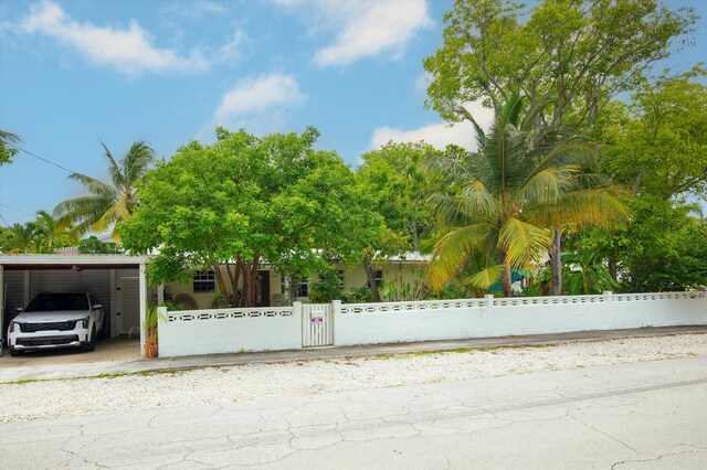 exterior space with a carport