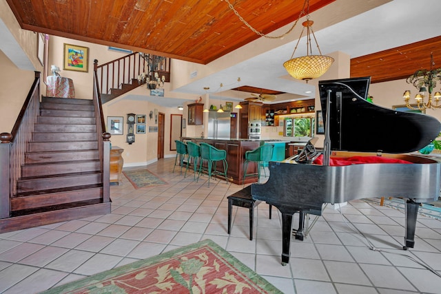 interior space with wooden ceiling, stairway, and light tile patterned flooring