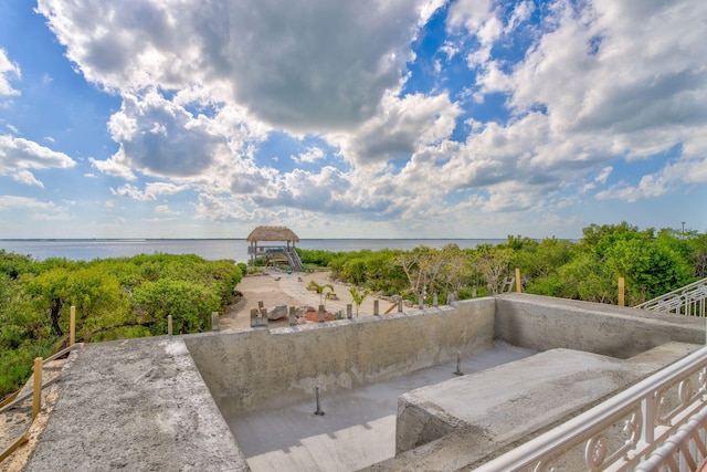 exterior space with a water view