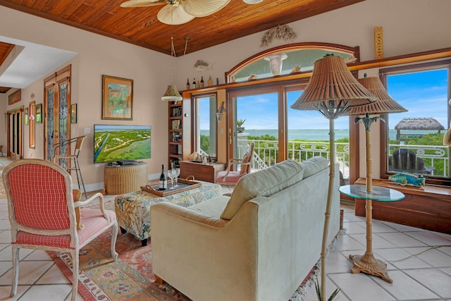 tiled living area with wooden ceiling and ceiling fan