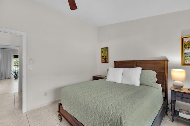 bedroom with ceiling fan and light tile patterned floors