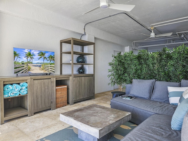 living room with ceiling fan