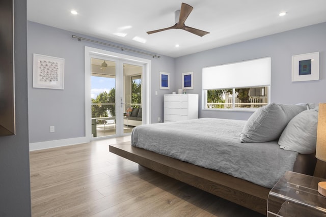 bedroom featuring ceiling fan, access to exterior, and light hardwood / wood-style floors