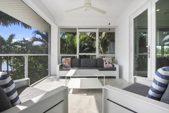 sunroom / solarium with ceiling fan