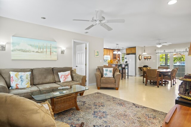 living room featuring ceiling fan