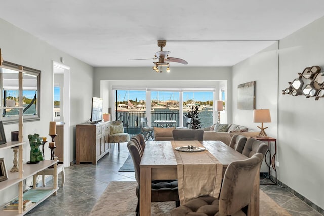 dining room with ceiling fan