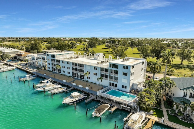 birds eye view of property featuring a water view