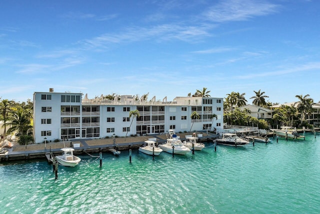 view of swimming pool with a water view