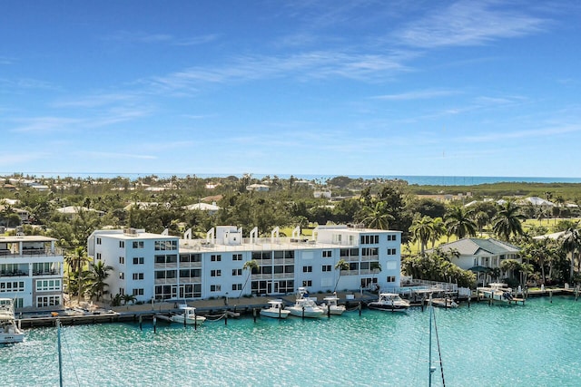 view of swimming pool with a water view