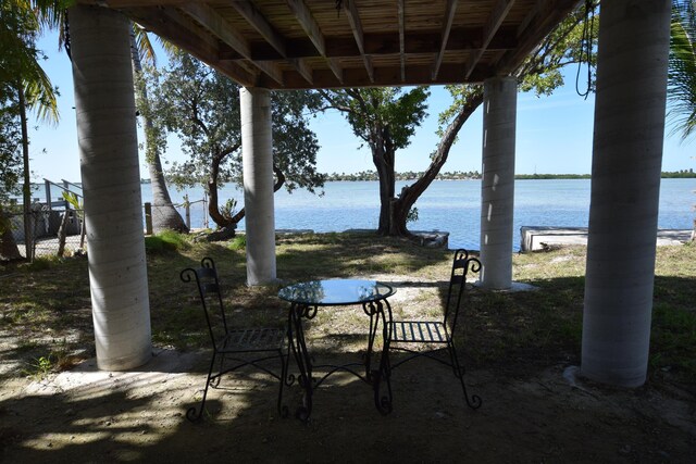 view of patio / terrace featuring a water view