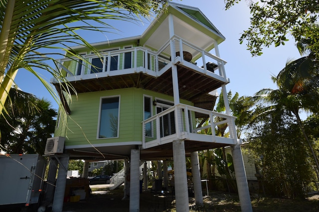 view of side of property featuring a carport