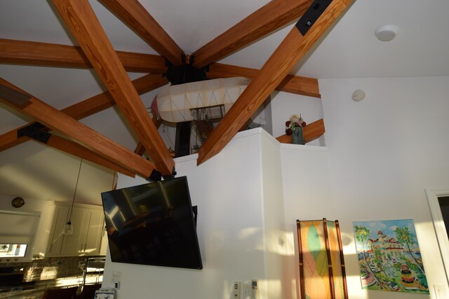 living room with beamed ceiling