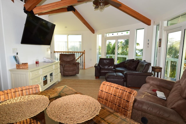 living room featuring vaulted ceiling with beams