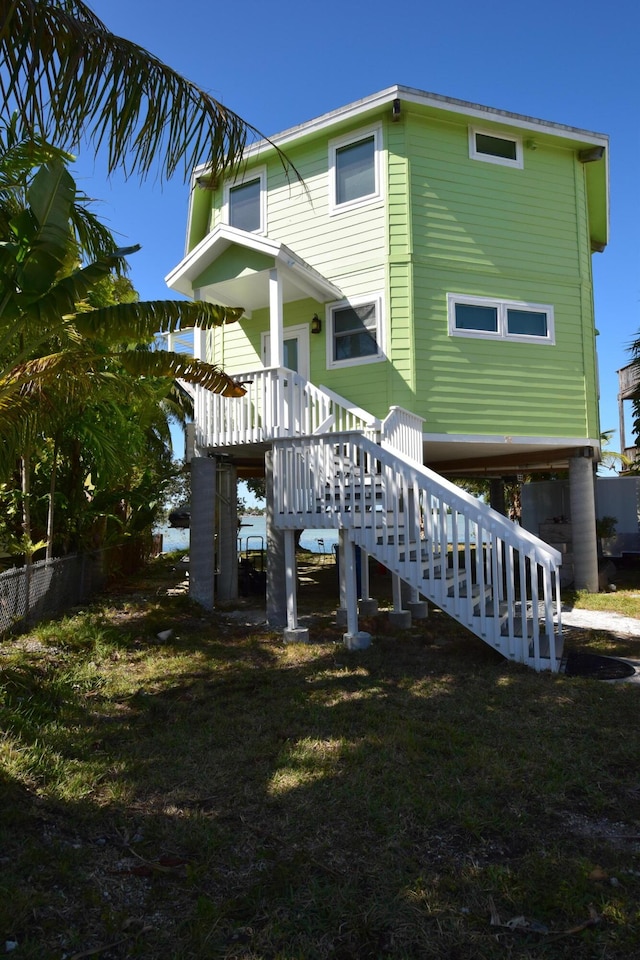 76 Palm Dr, Saddle Bunch, FL 33040 - back of house with stairway