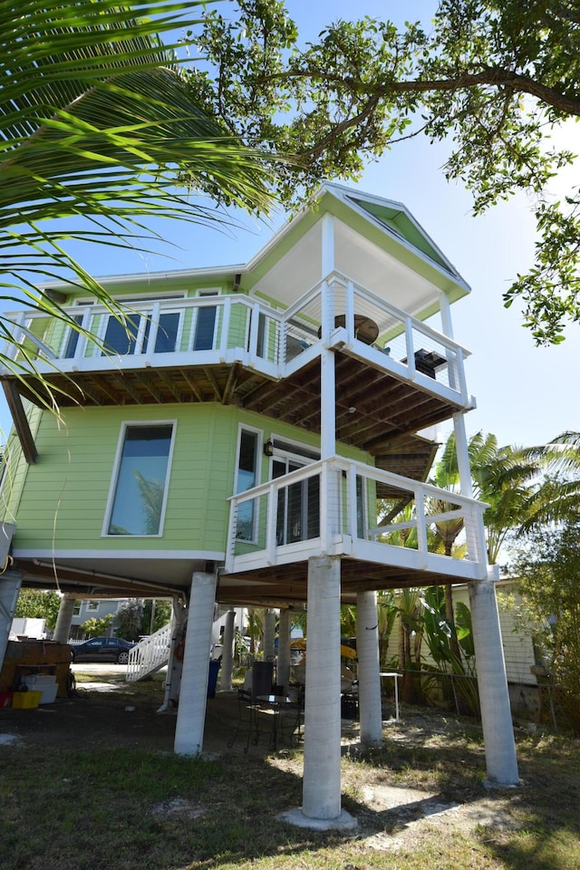 76 Palm Dr, Saddle Bunch, FL 33040 - exterior space featuring a wooden deck and stairs