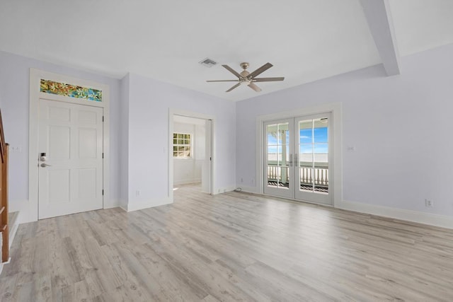 interior space with ceiling fan, french doors, a healthy amount of sunlight, and light wood-type flooring