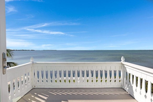 balcony featuring a water view