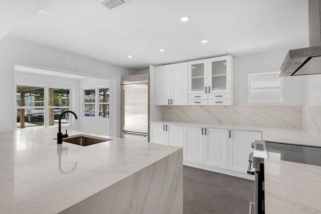 159 Iroquois Dr, Islamorada, FL 33036 - kitchen featuring wall chimney range hood, visible vents, recessed lighting, appliances with stainless steel finishes, and a sink