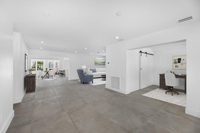 159 Iroquois Dr, Islamorada, FL 33036 - living room featuring visible vents, baseboards, and a barn door