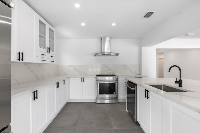 159 Iroquois Dr, Islamorada, FL 33036 - kitchen featuring wall chimney range hood, visible vents, recessed lighting, appliances with stainless steel finishes, and a sink