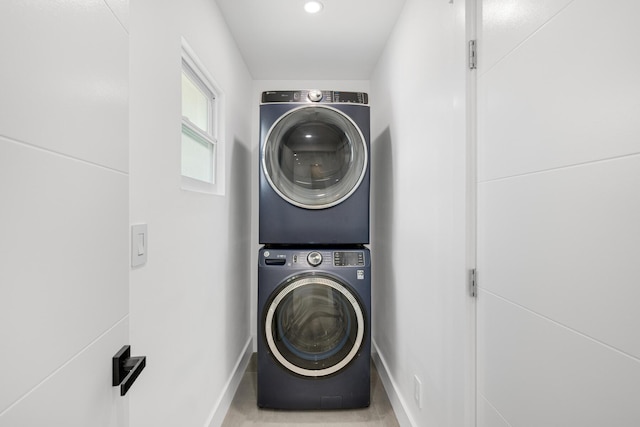 159 Iroquois Dr, Islamorada, FL 33036 - washroom featuring laundry area, baseboards, and stacked washer / drying machine