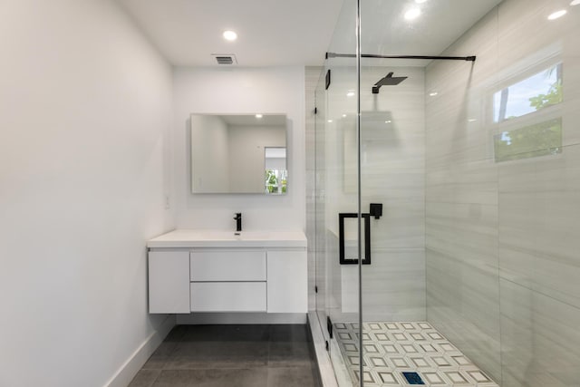 159 Iroquois Dr, Islamorada, FL 33036 - full bathroom with a shower stall, vanity, visible vents, recessed lighting, and baseboards