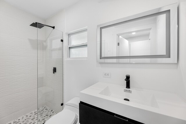159 Iroquois Dr, Islamorada, FL 33036 - bathroom with toilet, a stall shower, and vanity
