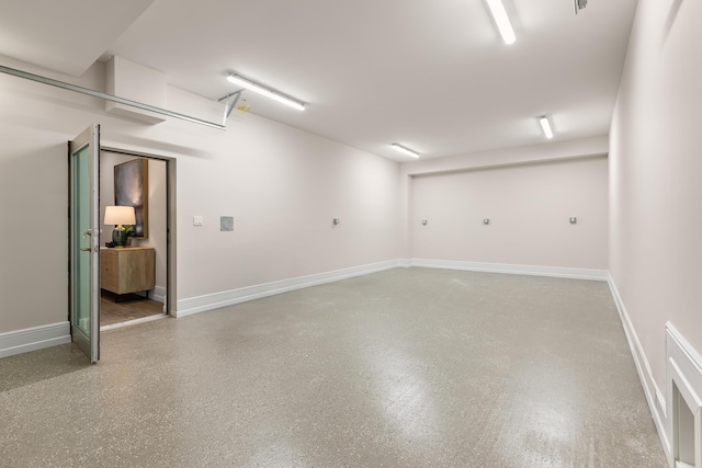 garage with baseboards