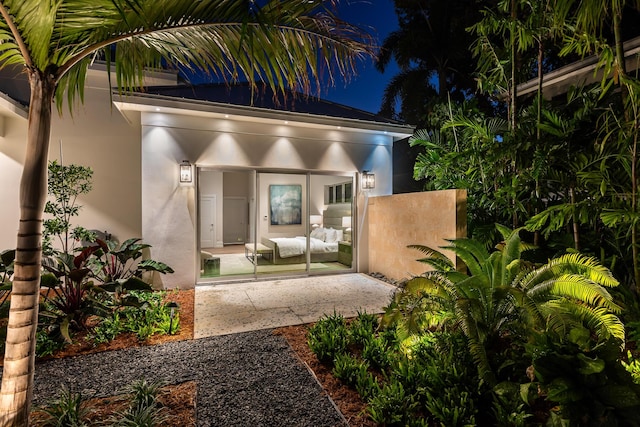 exterior space featuring a patio and stucco siding