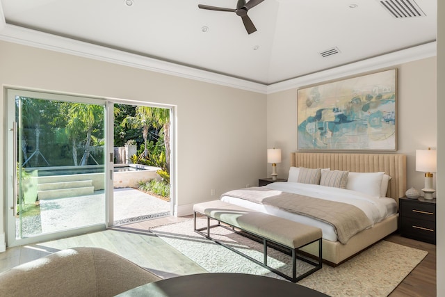 bedroom with lofted ceiling, access to exterior, visible vents, and wood finished floors