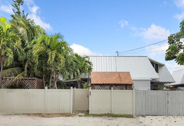 3225 Eagle Ave, Key West, FL 33040 - view of side of home featuring metal roof