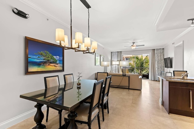 3841 N Roosevelt Blvd Unit 222, Key West, FL 33040 - tiled dining space with crown molding, sink, and ceiling fan with notable chandelier
