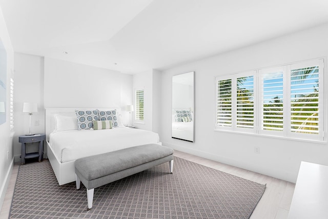 bedroom with light hardwood / wood-style flooring