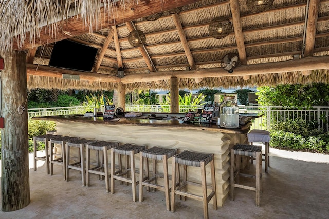 view of patio with a gazebo and a bar