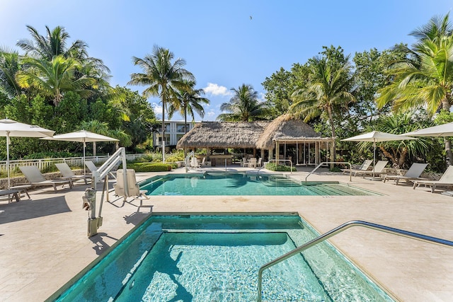 view of swimming pool featuring a gazebo and a patio