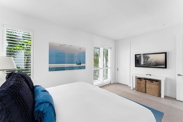 bedroom featuring light wood-type flooring