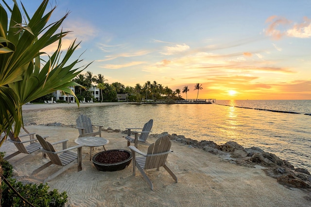 water view with an outdoor fire pit