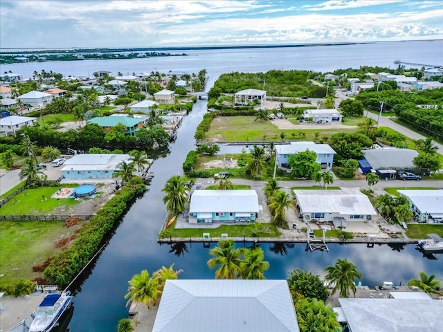 aerial view with a residential view and a water view