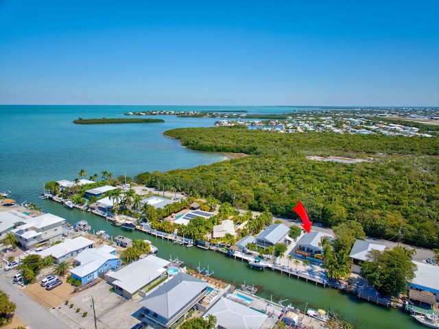 aerial view featuring a residential view and a water view