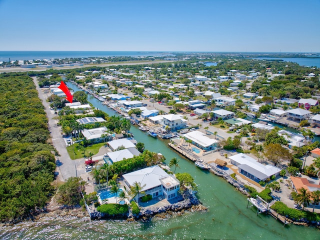 aerial view with a residential view and a water view