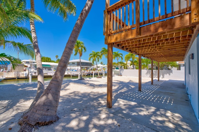 view of patio / terrace with a boat dock