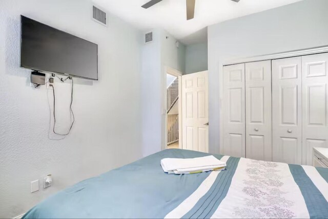 bedroom with a closet and ceiling fan