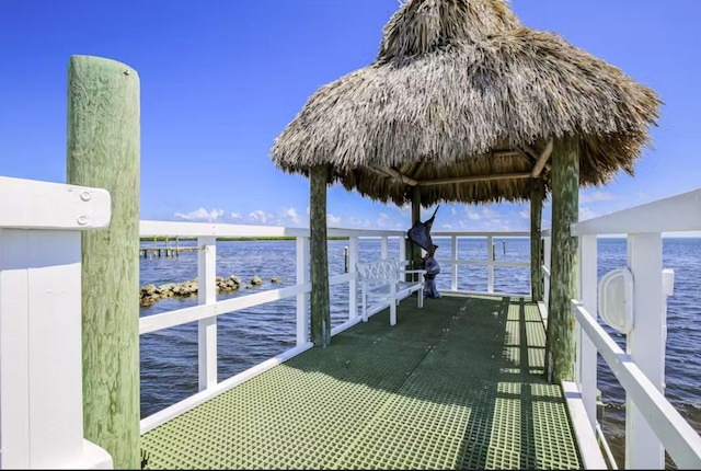 dock area featuring a gazebo and a water view