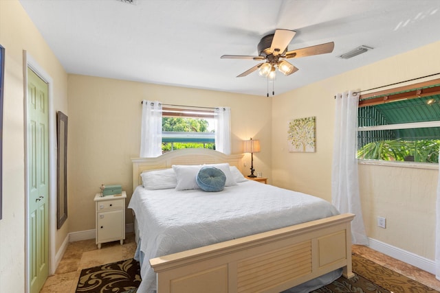 bedroom featuring ceiling fan