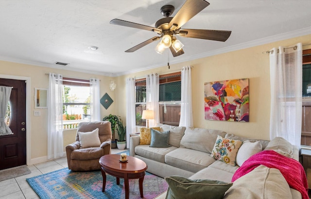 tiled living room with crown molding and ceiling fan