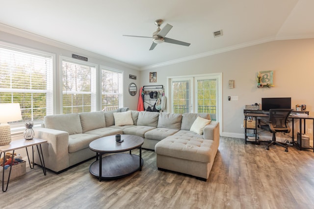 27163 Mariposa Rd, Ramrod, FL 33042 - living area with ornamental molding, ceiling fan, wood finished floors, and a wealth of natural light