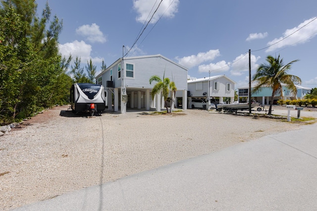 27163 Mariposa Rd, Ramrod, FL 33042 - beach home featuring driveway