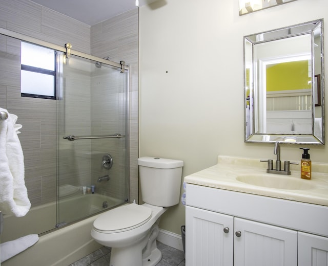 full bathroom with enclosed tub / shower combo, vanity, toilet, and tile patterned floors