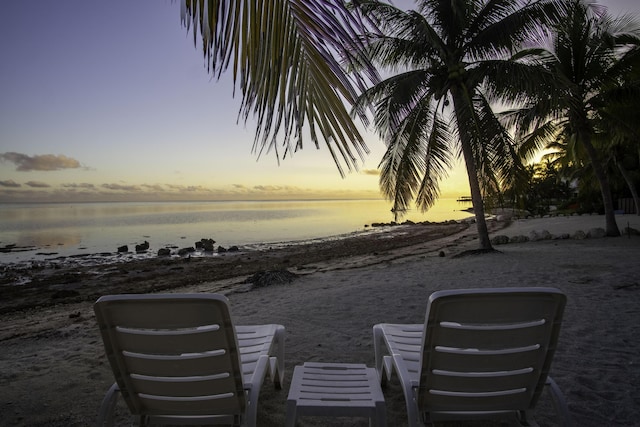 patio terrace at dusk with a water view