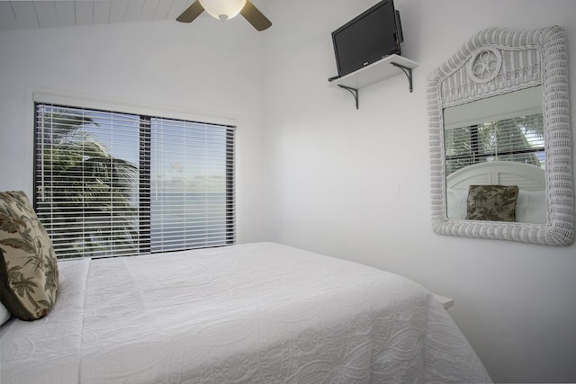 bedroom featuring lofted ceiling and ceiling fan